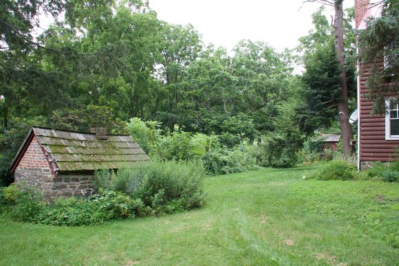 smokehouse and backyard