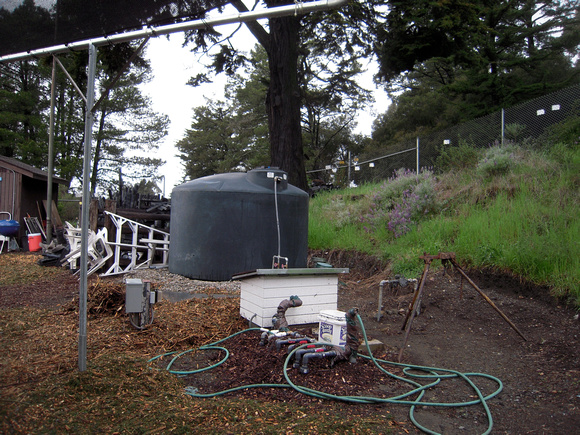 water tank and pump house at nursery- so long in coming